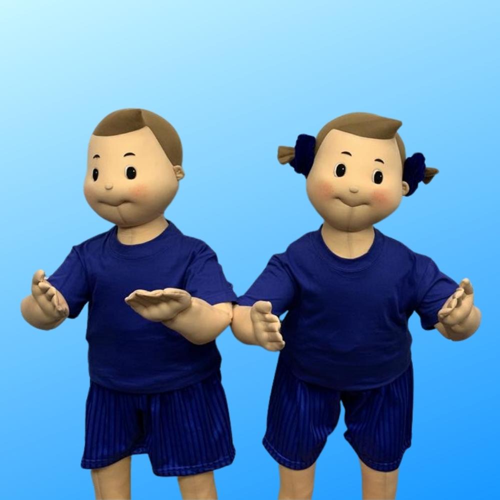 Boy and girl mannequin dressed in Dovery Down PE Kit